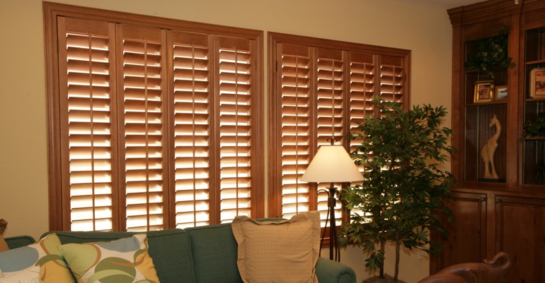 Wood shutters in Dover living room.